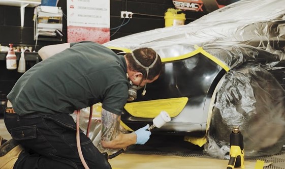 Refinish the damaged area on the bumper